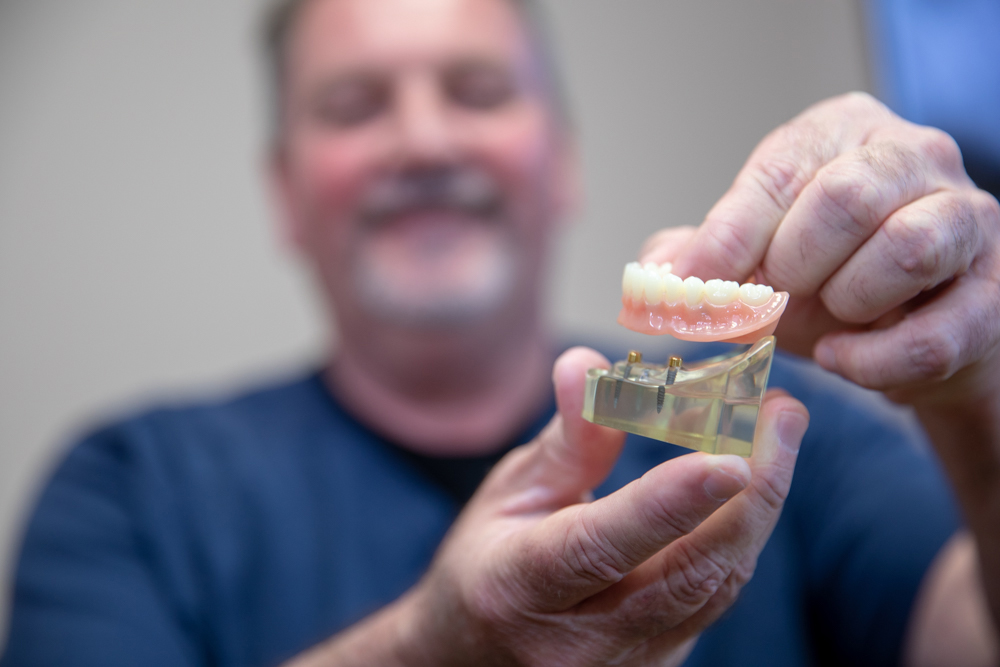 Dr Nick brand showing implant supported dentures Ocala , FL