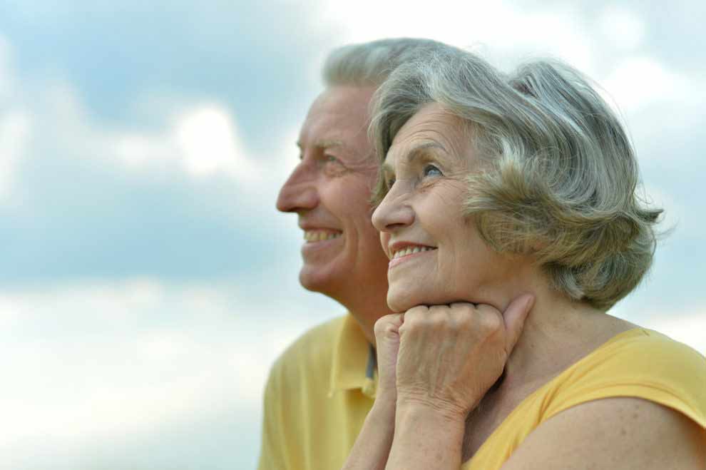 patients smiling with zirconia dental implants