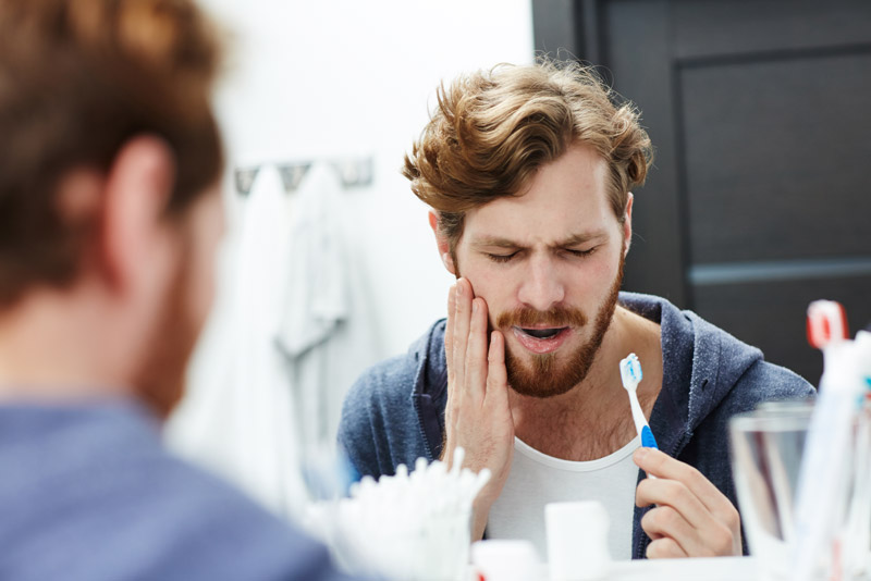 Dental Patient With Dental Pain, From The Symptoms Of Gum Disease