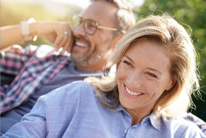 Full Arch Dental Implant Patients Smiling After Their Dental Implant Procedures