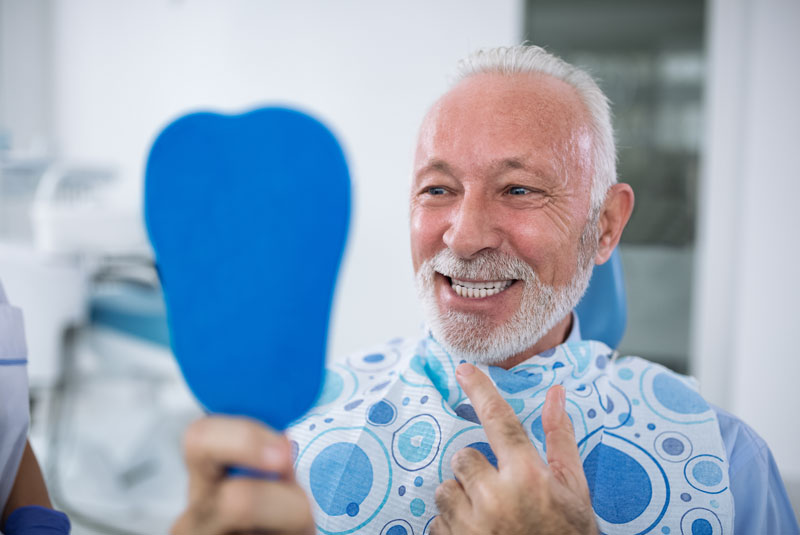 Dental Patient Smiling After His Procedure