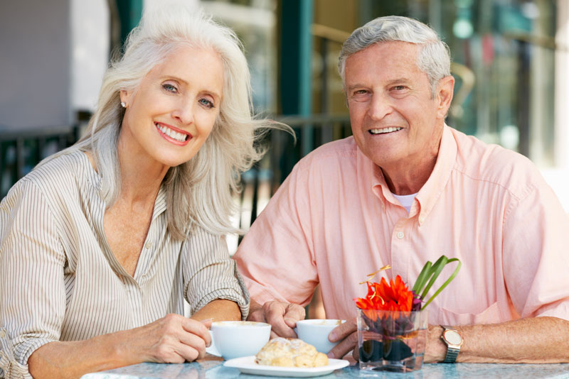 dental patients smiling after their dental implant procedure