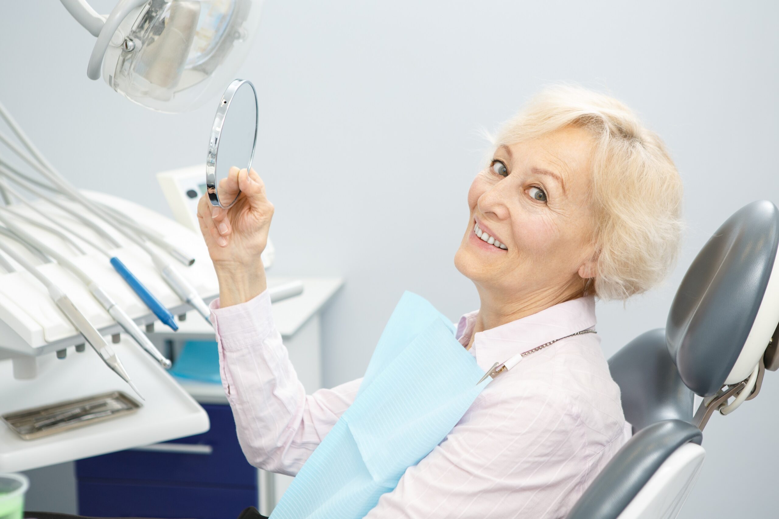 An image of a woman at a dental practice.