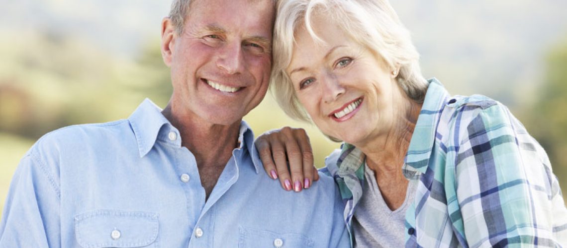 Dental Implant Patients Happily Smiling After Their Dental Implant Procedures