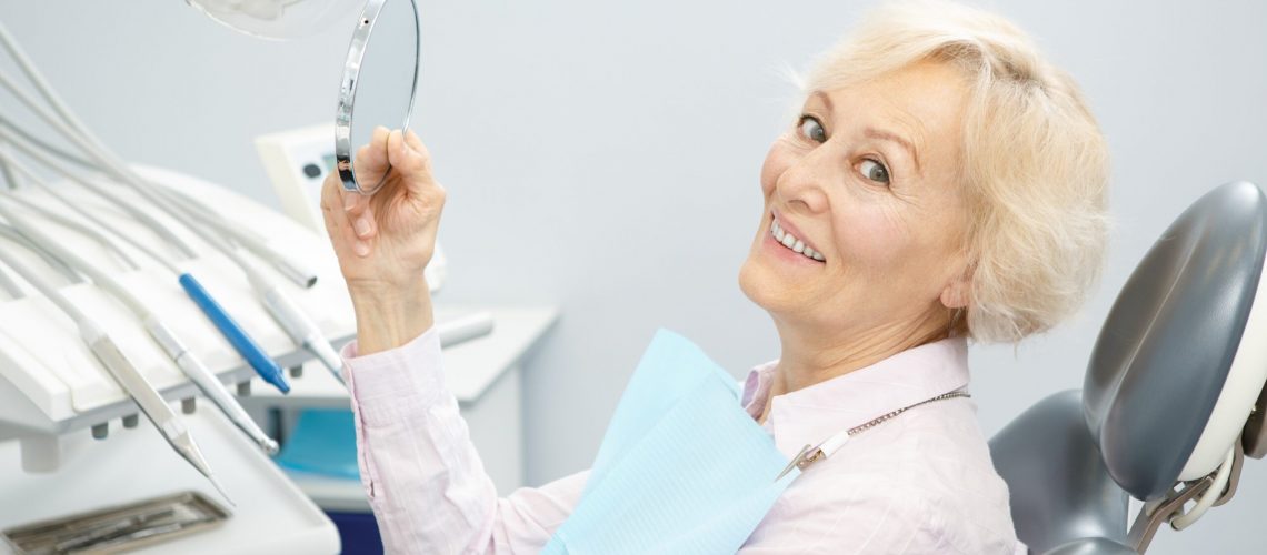 An image of a woman at a dental practice.
