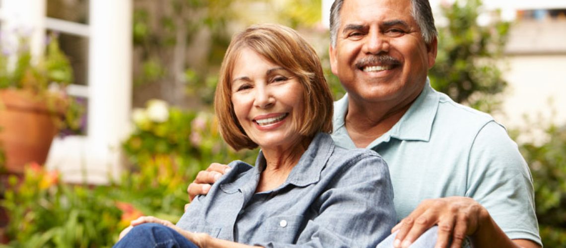 Two Dental Implant Patients Smiling Together