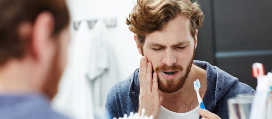 Dental Patient With Dental Pain, From The Symptoms Of Gum Disease