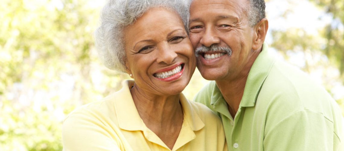 Dental Patients Smiling Together With Dental Implants